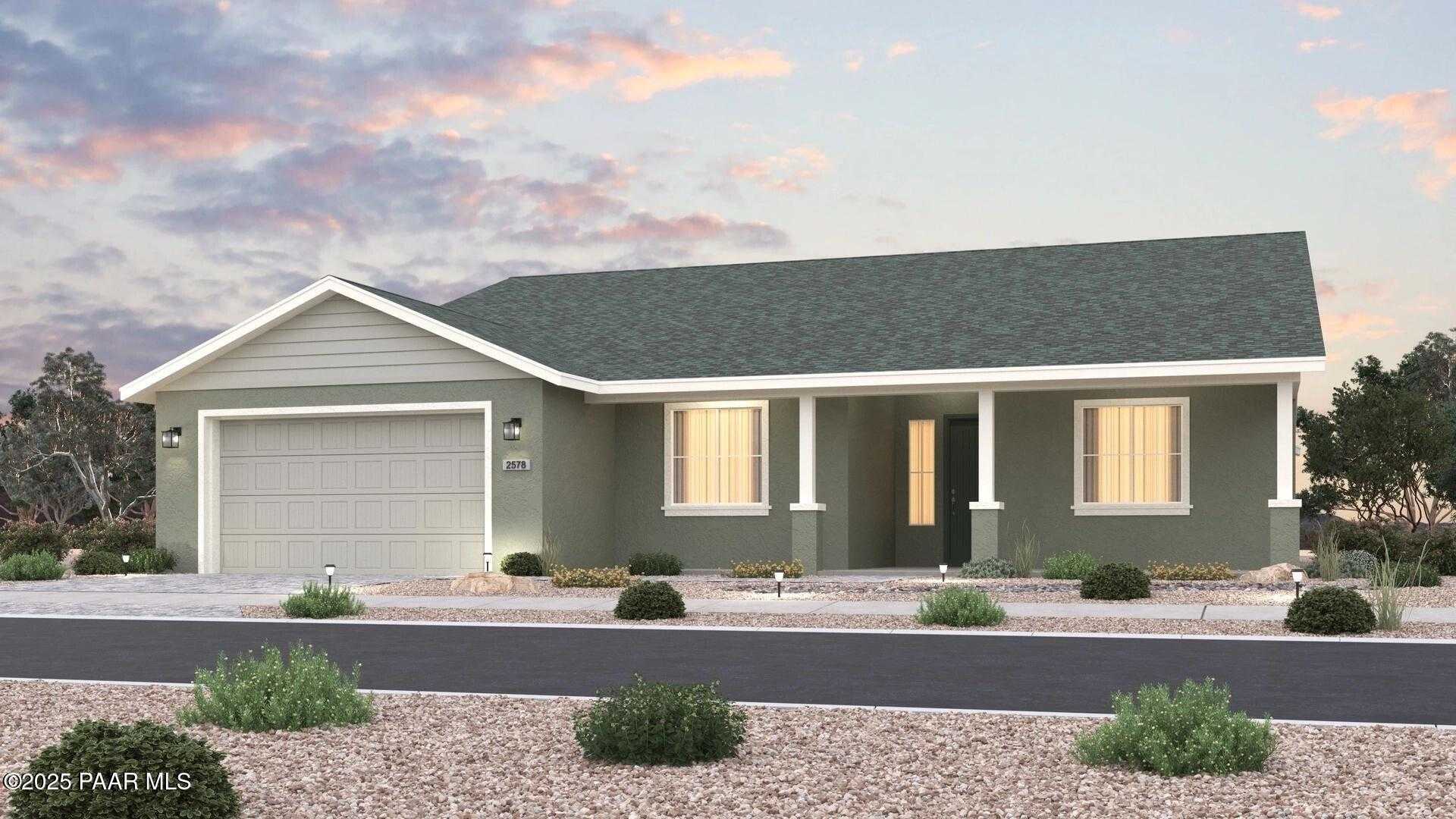 Single-story 3-bed, 3-bath home with 4-car garage, gray siding, and desert landscaping in Morningstar, Prescott Valley, AZ - Evermore Homes Sunrise A