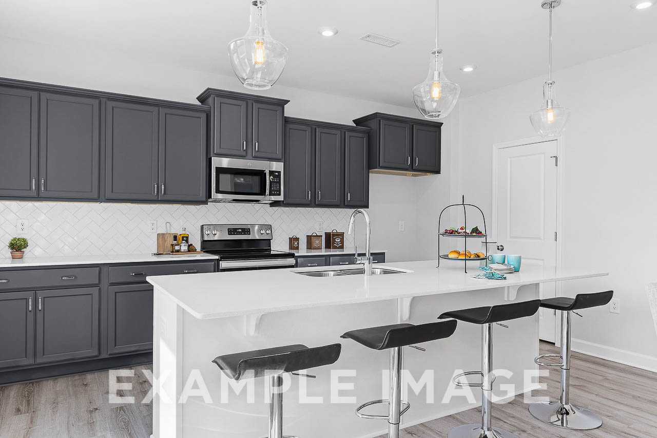 Davidson Homes The Chestnut Plan Kitchen Island with counter height stools