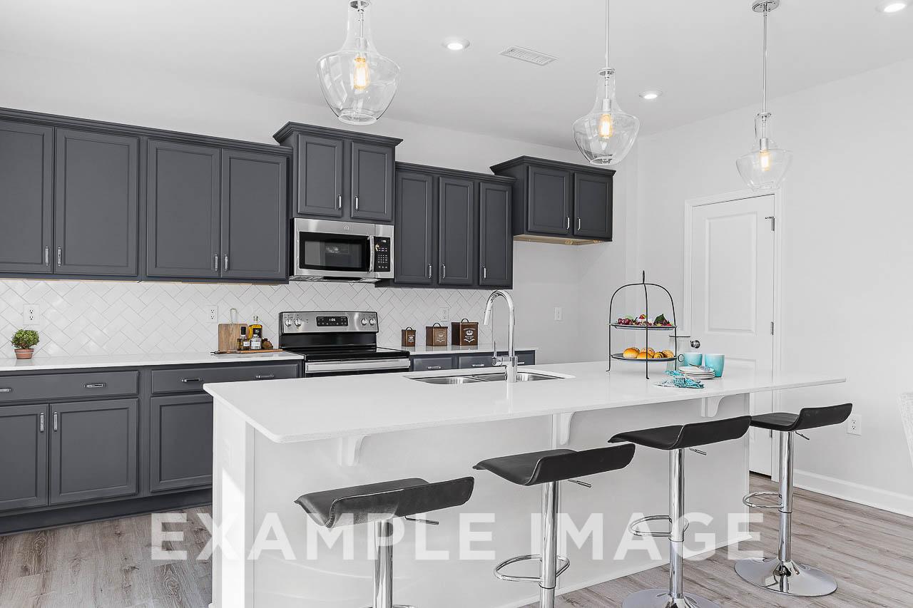 Davidson Homes The Chestnut Plan Kitchen Island with counter height stools