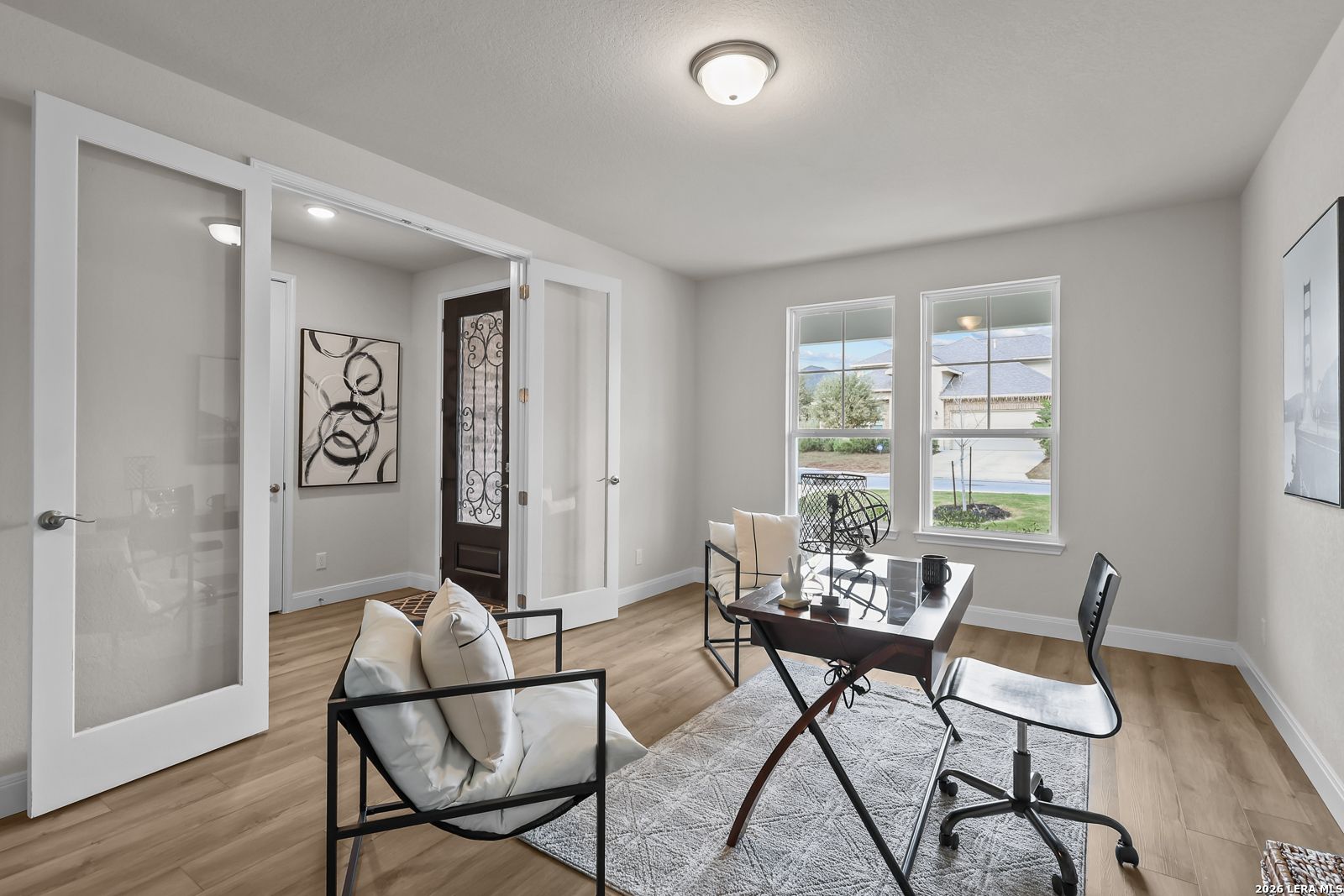 Bright home office with French doors in The Lanier H floor plan by Davidson Homes at Ladera in San Antonio, Texas.