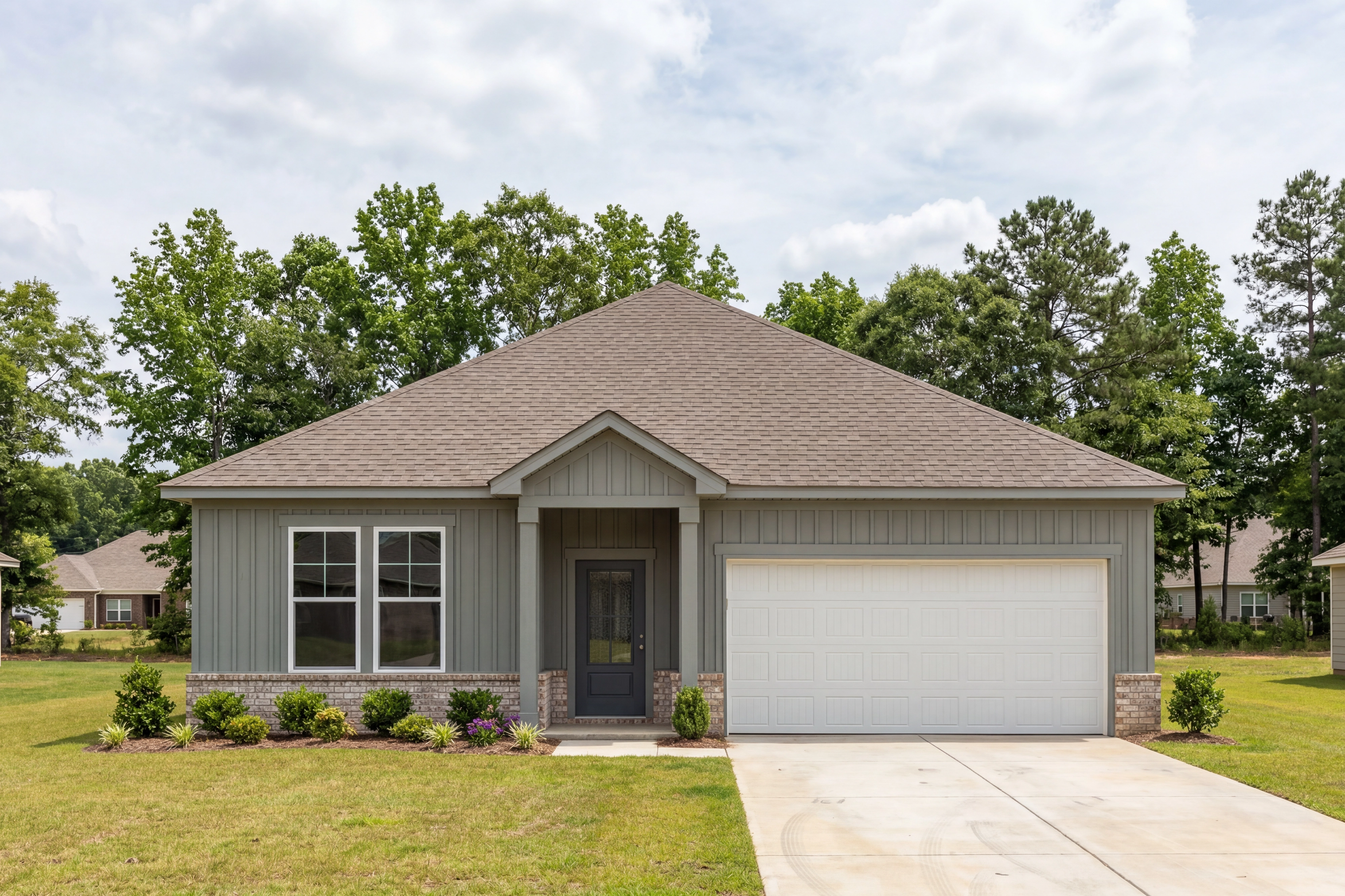 The Laurel J single-family home in Cullman, Alabama features a 1-story design with cement-concrete siding and 2-car garage.