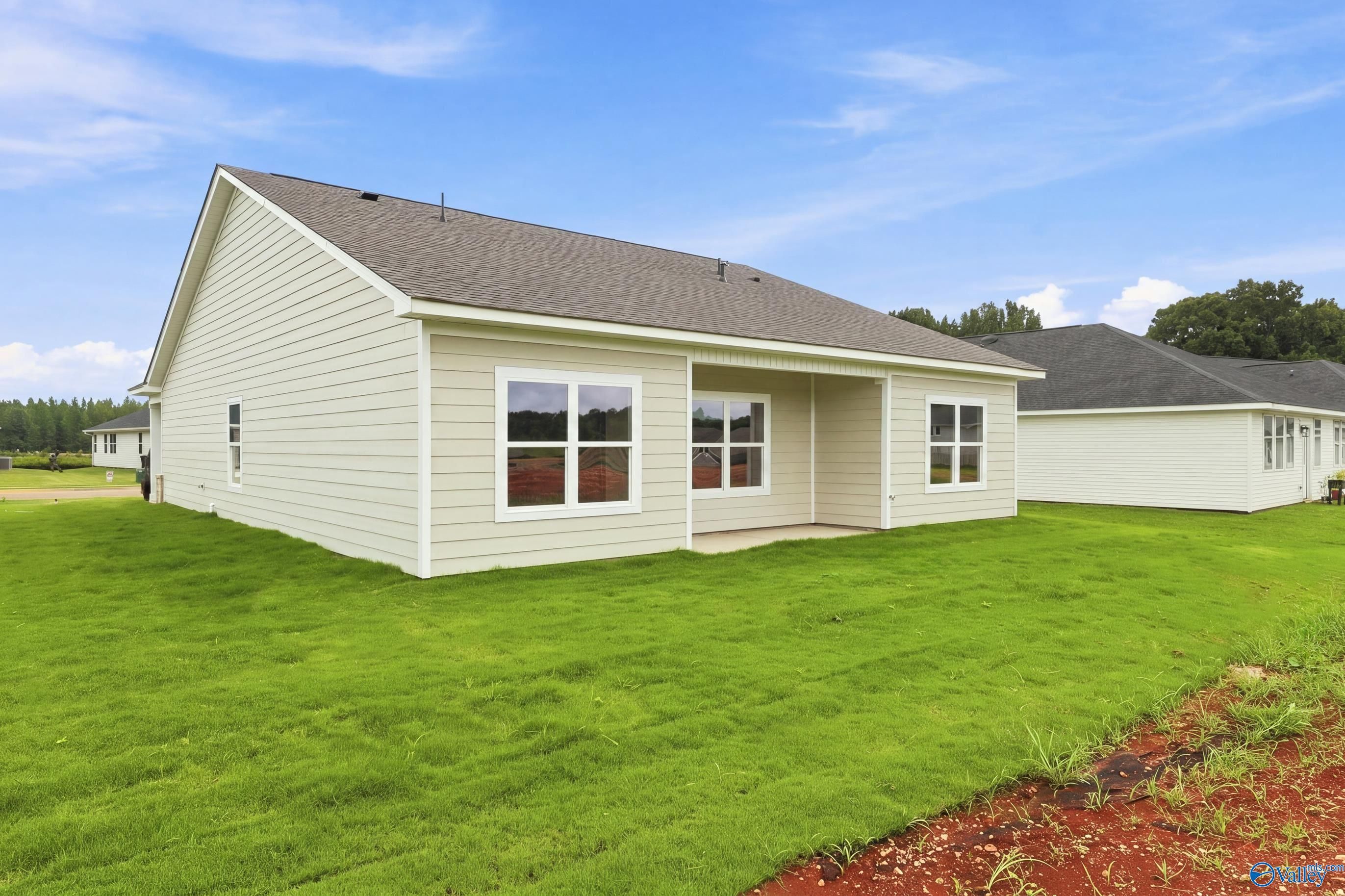 Rear exterior view of The Asheville E floor plan by Davidson Homes in Forest Glen, Hazel Green, Alabama.