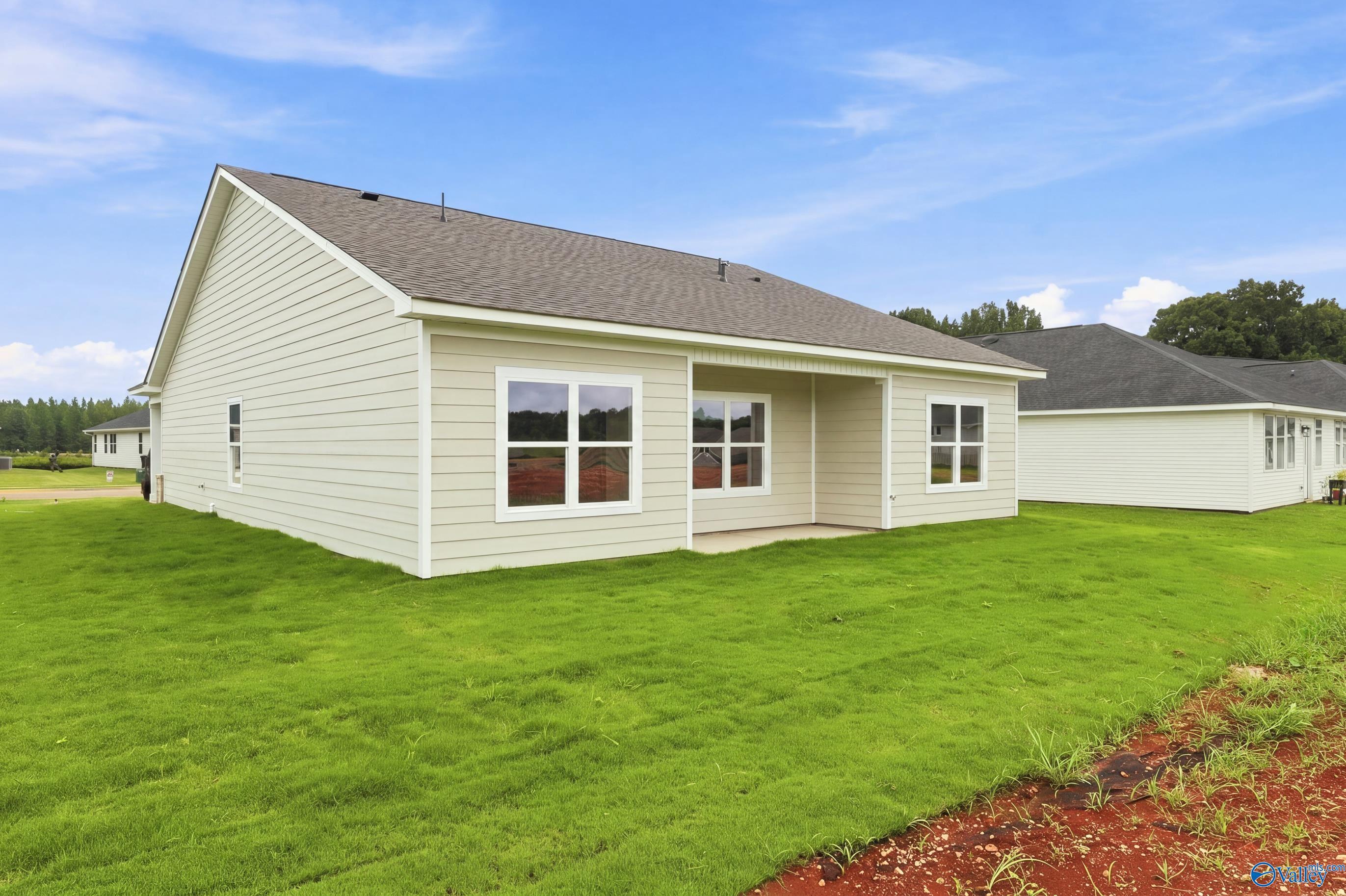 Rear exterior view of The Asheville E floor plan by Davidson Homes in Forest Glen, Hazel Green, Alabama.