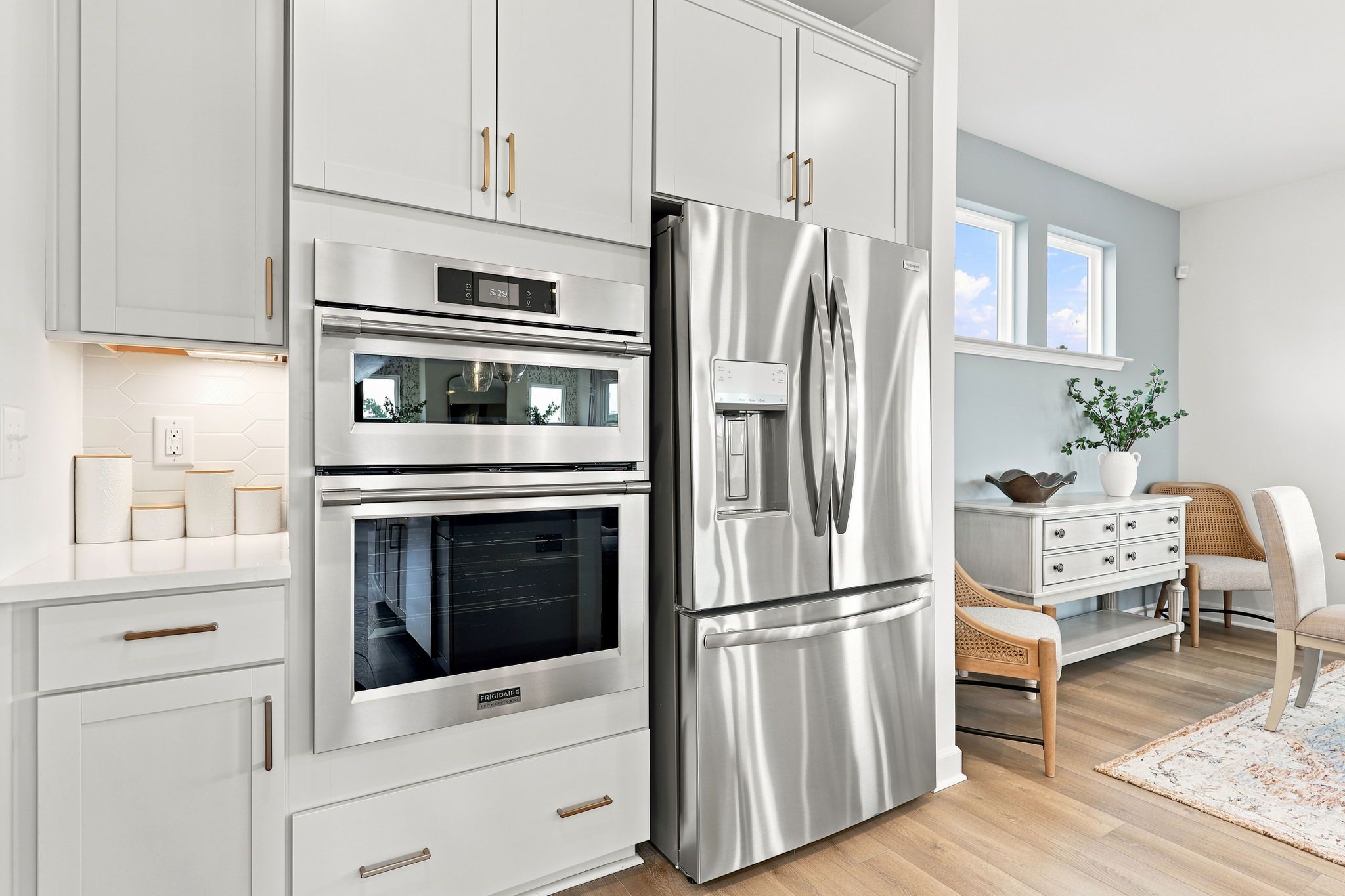 Modern kitchen with stainless steel appliances at Montrose in Aberdeen, NC, built by Davidson Homes.