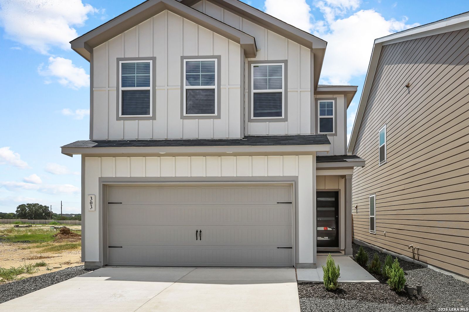 Two-story Gillian C floor plan by Davidson Homes with a 2-car garage in Meadows at Oak Creek, San Antonio, Texas.
