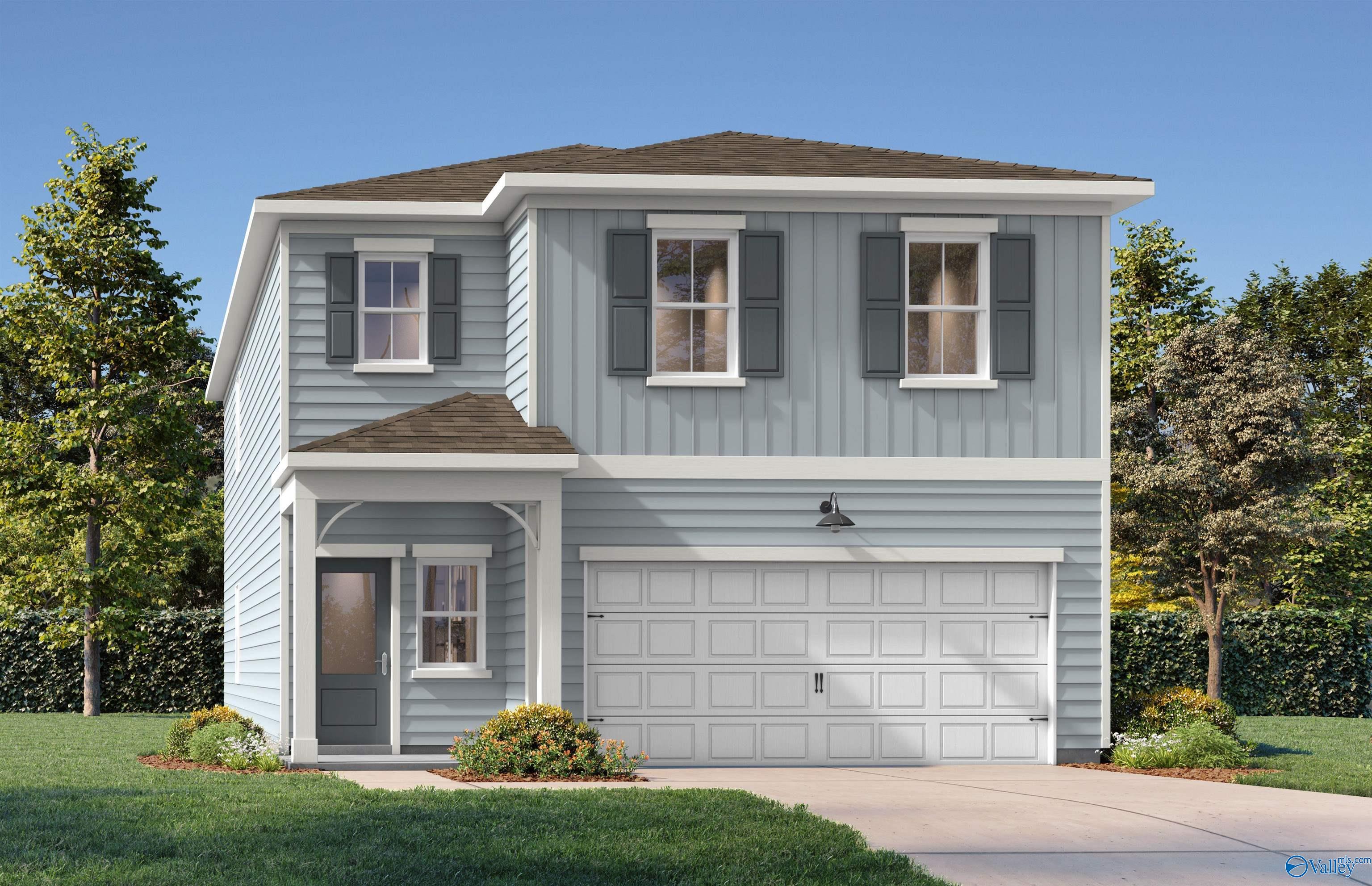 Light blue 1-story home with 2-car garage, front porch, black shutters, and landscaped yard in Spragins Cove, Huntsville, Alabama by Davidson Homes The Russell A