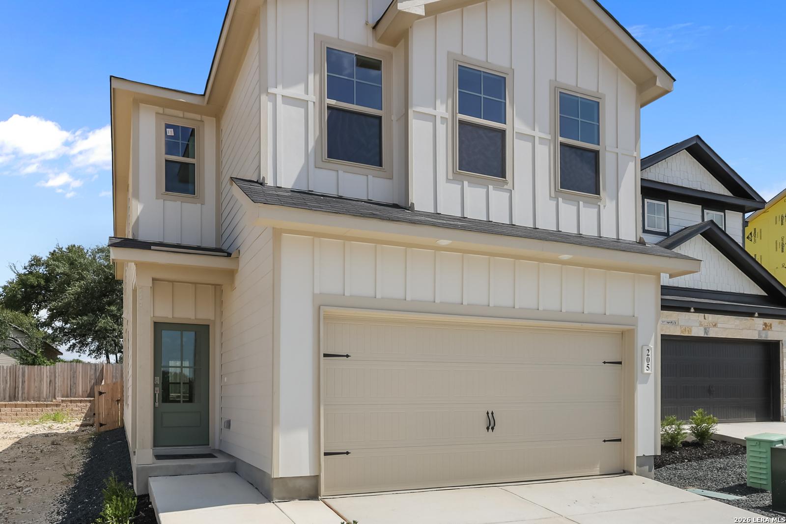 Two-story Gillian C floor plan by Davidson Homes with a 2-car garage in Meadows at Oak Creek, San Antonio, Texas.