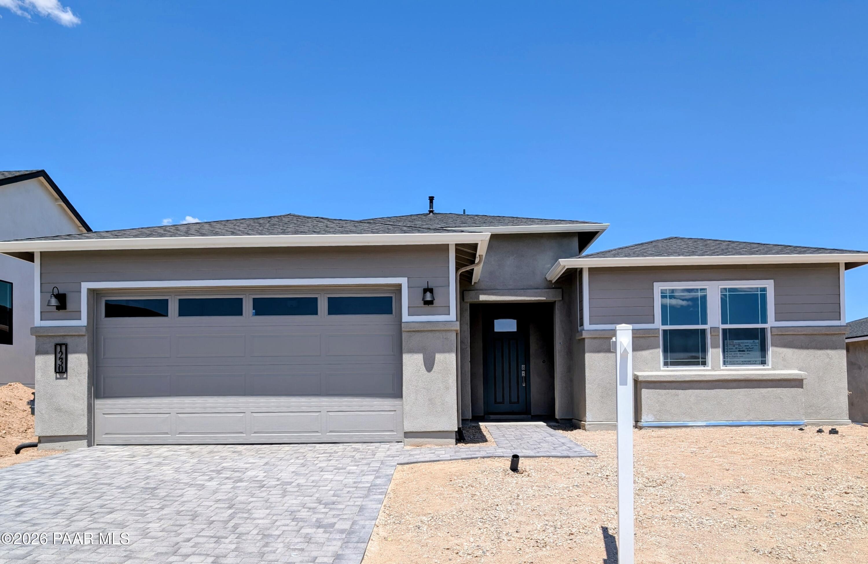 Exterior of Durango II F floor plan by Davidson Homes with 3-car garage in South Ranch Western Collection, Prescott, AZ.