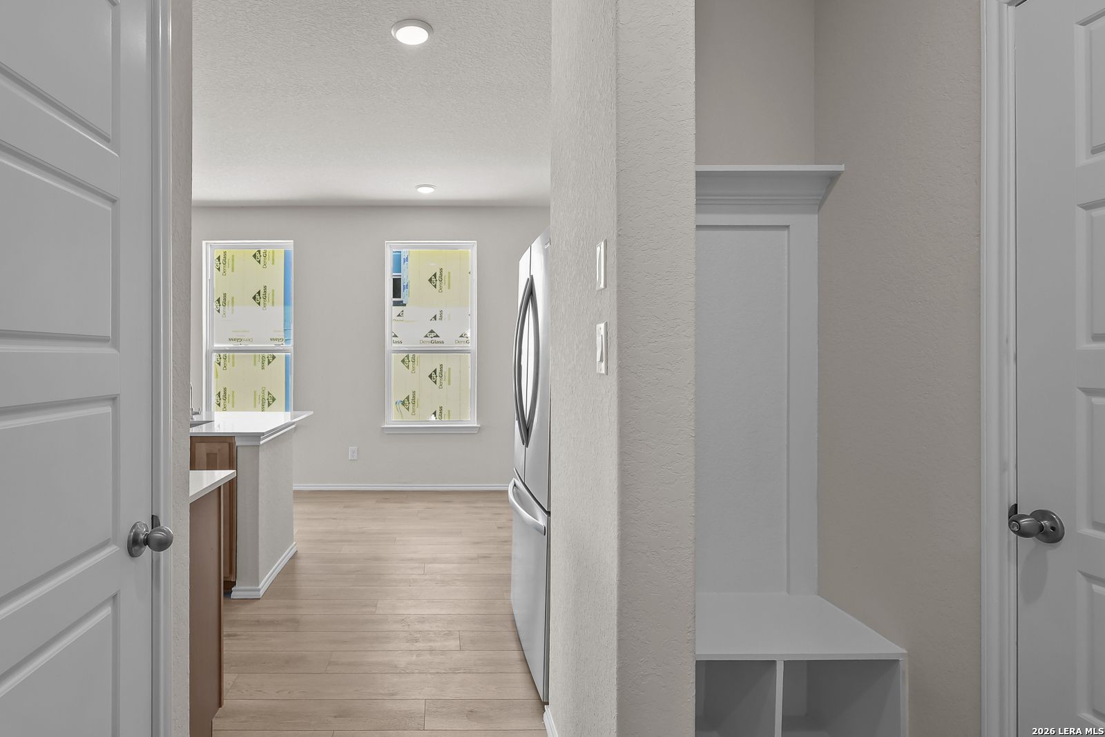 Built-in mudroom bench in The Gillian B floor plan by Davidson Homes at Meadows at Oak Creek, San Antonio, Texas.