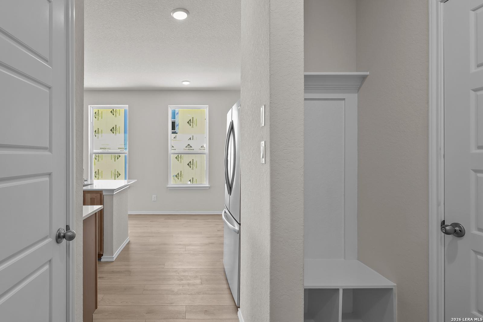 Built-in mudroom bench in The Gillian B floor plan by Davidson Homes at Meadows at Oak Creek, San Antonio, Texas.