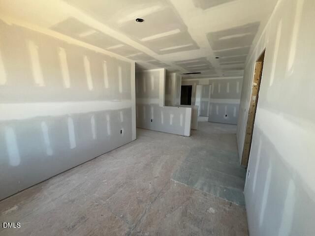 Unfinished drywall interior under construction in Davidson Homes The Ash C floor plan at Retreat at North Main, Lillington, NC