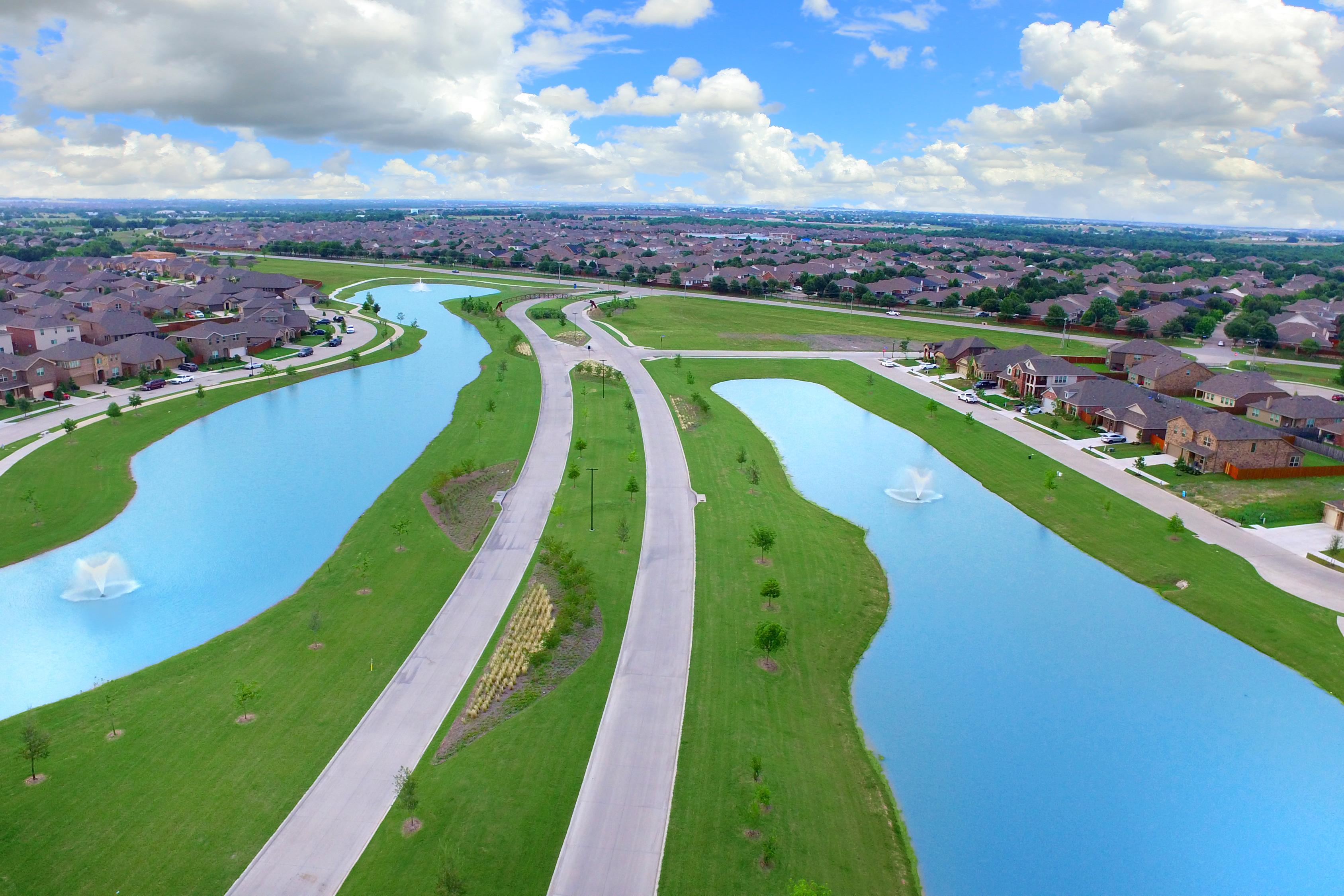 Grand entry with amenity lakes