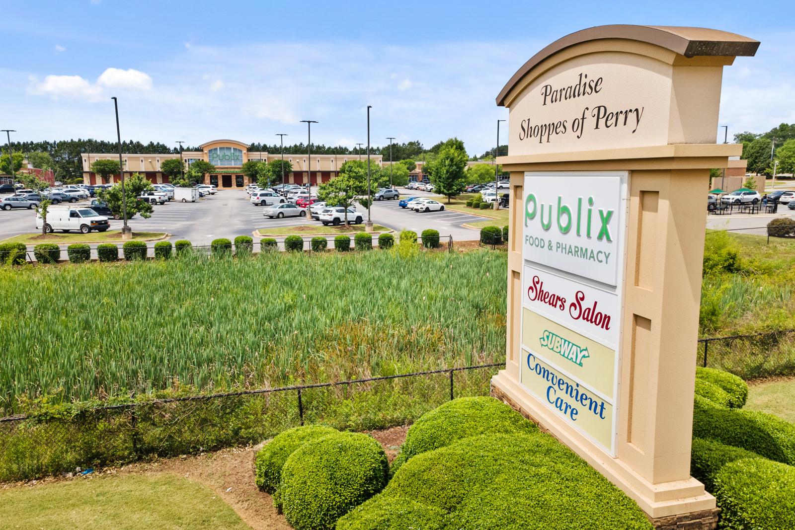 Paradise Shoppes of Perry near Ivy Glen featuring Publix, local retail, and dining options in Perry, Georgia.