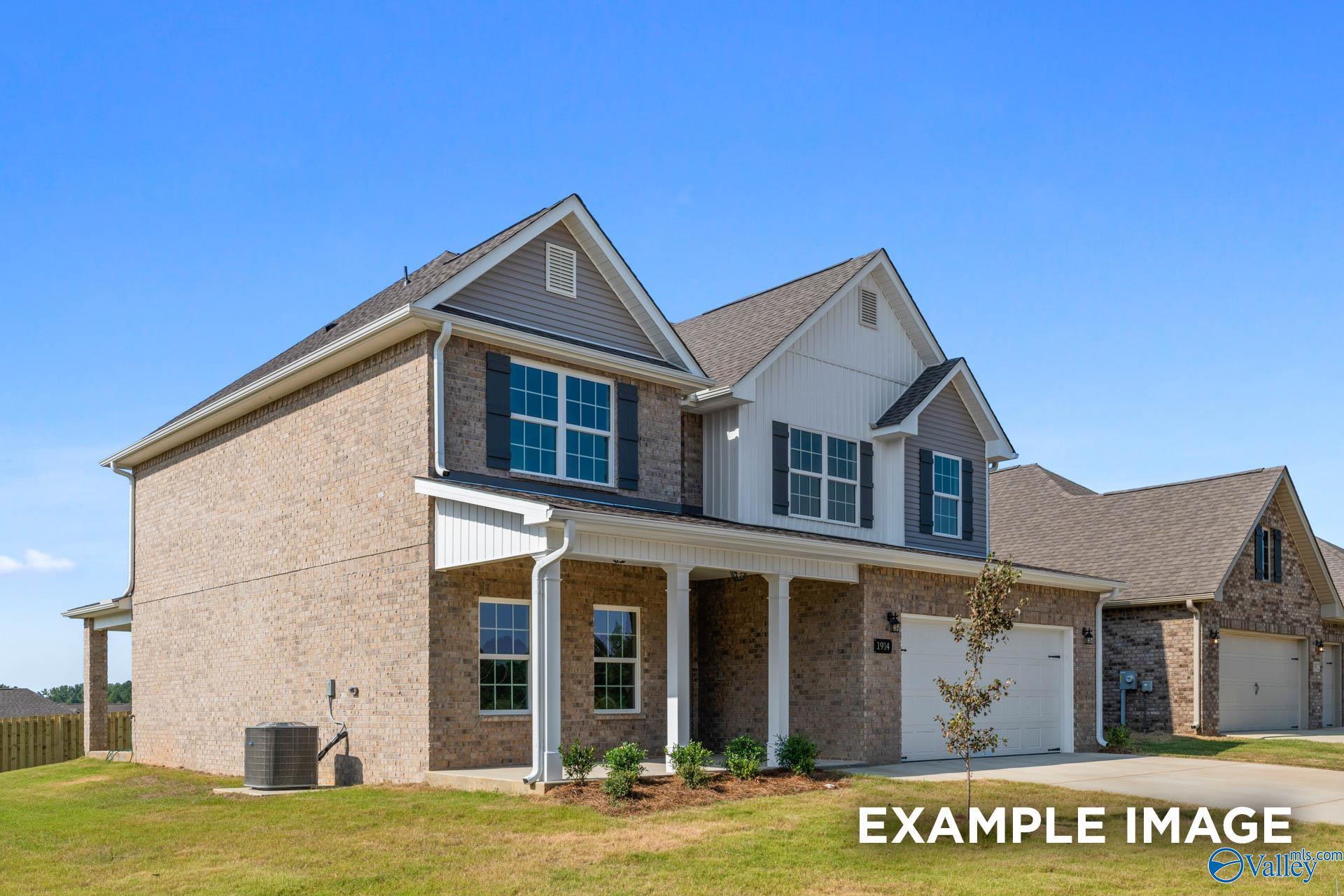 Two-story brick home with gabled roof, covered porch, and 2-car garage in Creek Grove, New Market, Alabama - Davidson Homes Shelby B