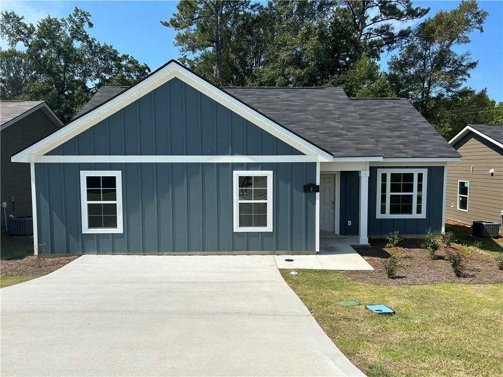 Navy blue 1-story 3-bedroom home with white trim, gabled roof, and driveway in Summer Vineyard, Phenix City, Alabama by Davidson Homes
