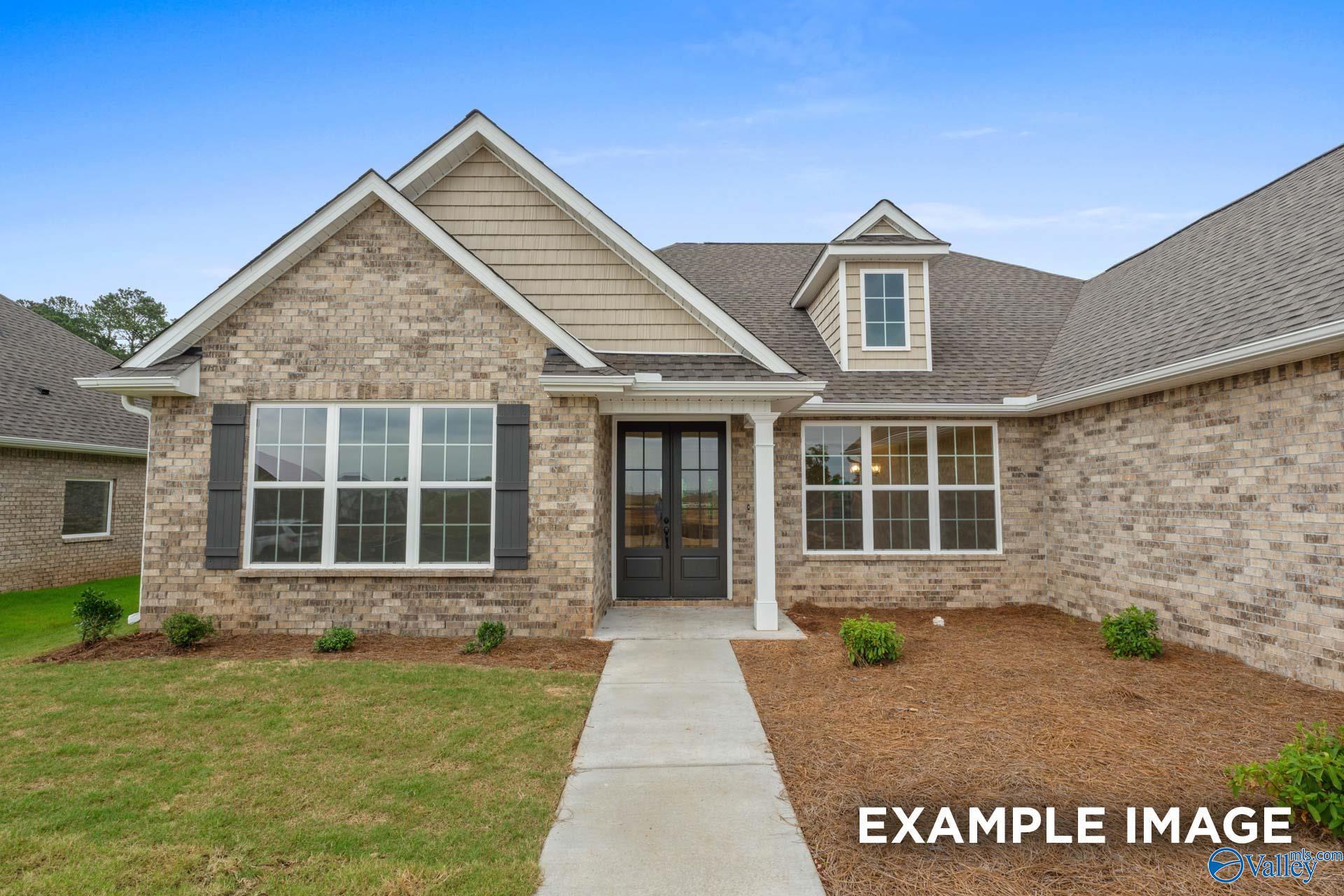 Charming brick exterior of 3-bedroom The Finleigh home by Davidson Homes in Briercreek, Meridianville, Alabama