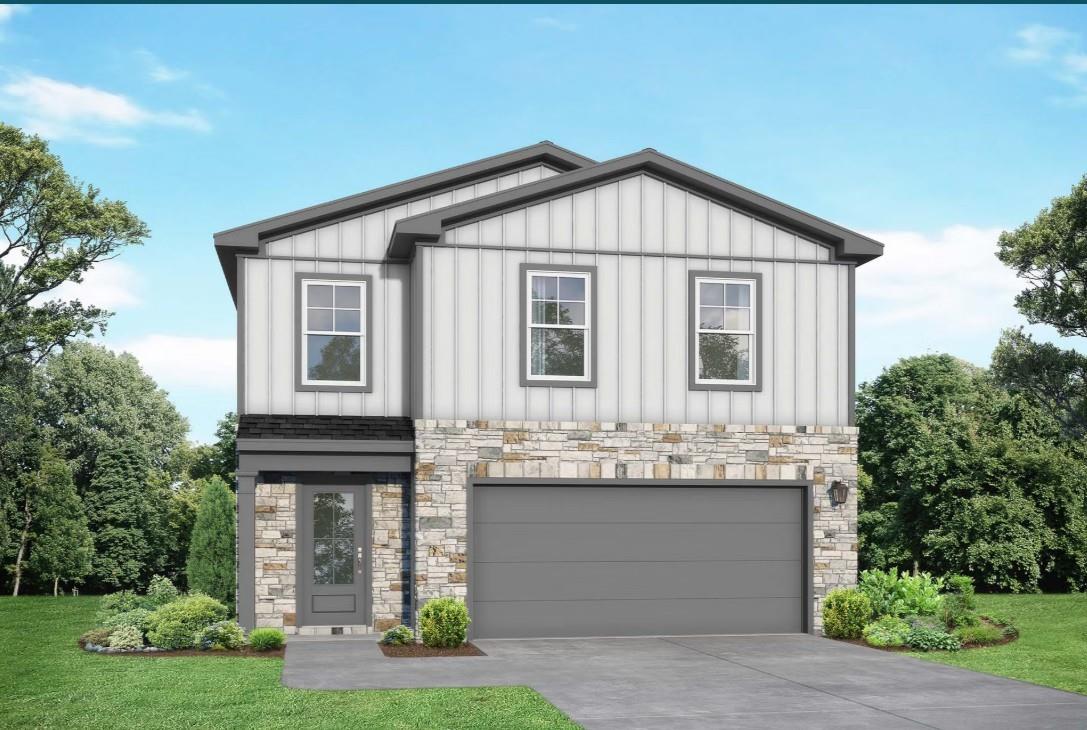 Modern 2-story Blanco E home by Davidson Homes in Windmill Estates, Magnolia, TX: white siding, stone accents, 2-car garage