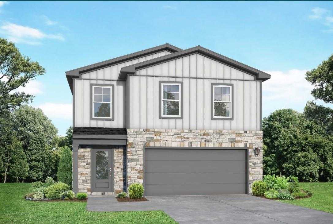 Modern 2-story Blanco E home by Davidson Homes in Windmill Estates, Magnolia, TX: white siding, stone accents, 2-car garage