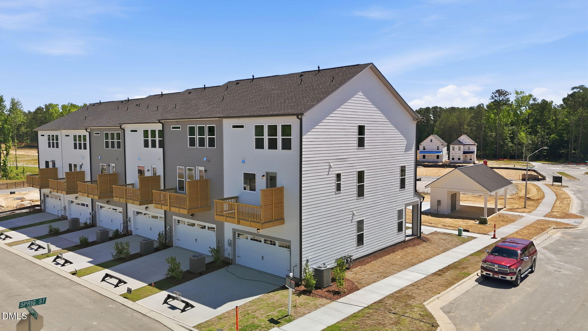 3-story Avery exterior townhome with 2-car garage at Forestville Yard Townhomes in Knightdale, North Carolina.