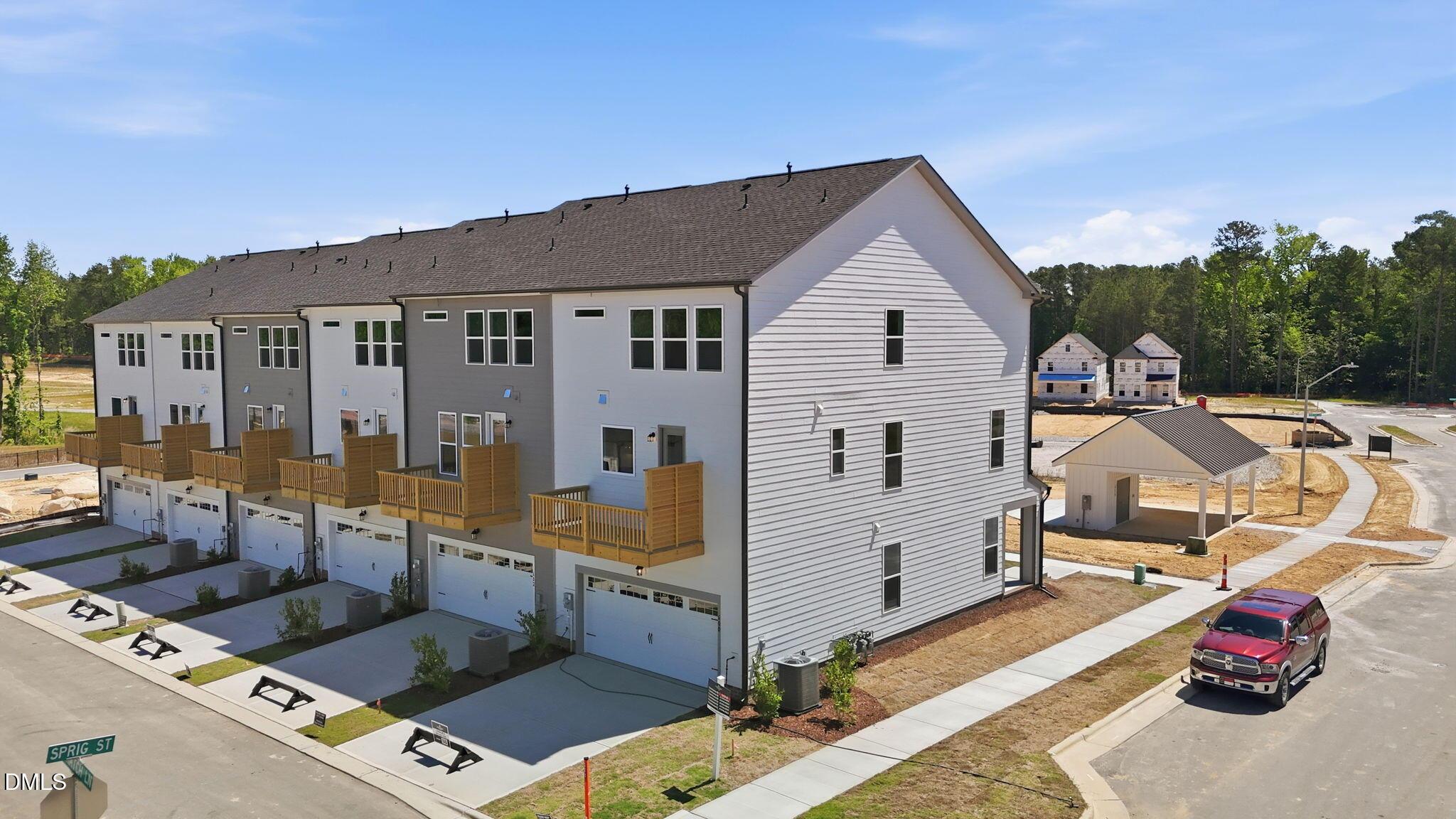 3-story Avery exterior townhome with 2-car garage at Forestville Yard Townhomes in Knightdale, North Carolina.