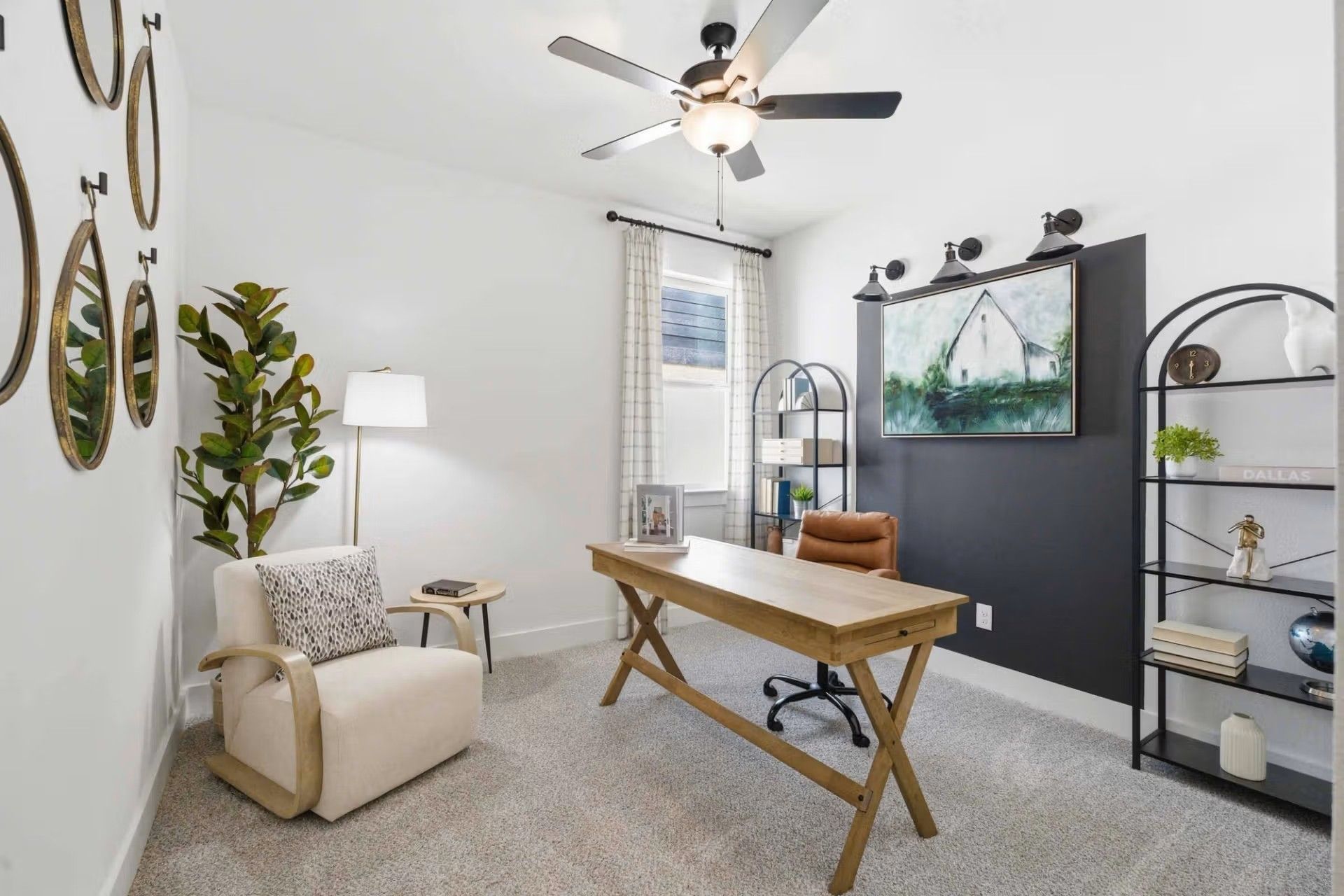 Modern home office with wooden desk and accent wall in The Laurel O floor plan by Davidson Homes in Mercer Meadows, Texas.