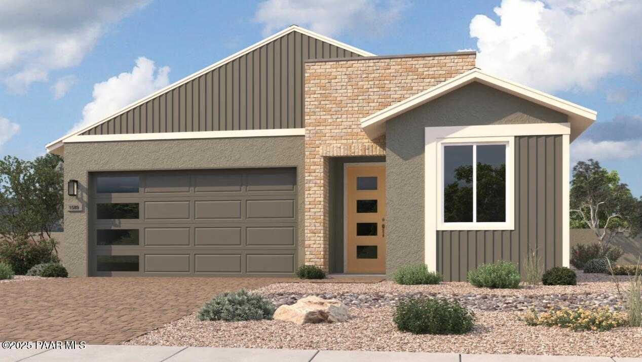 Modern single-story home with 3-car garage, brick accents, and desert landscaping in Prescott, Arizona - Davidson Homes The Frontier II H