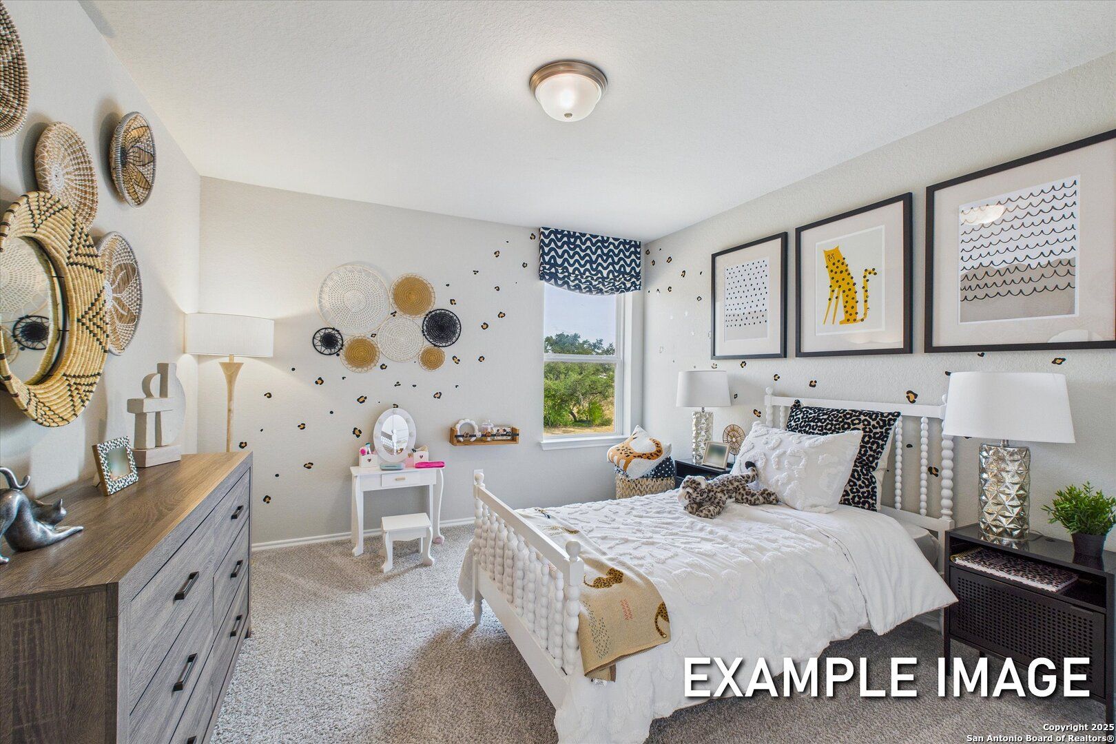 Charming girl's bedroom with white twin bed, vanity, and woven wall art in Davidson Homes The Sabine C, Agave, San Antonio