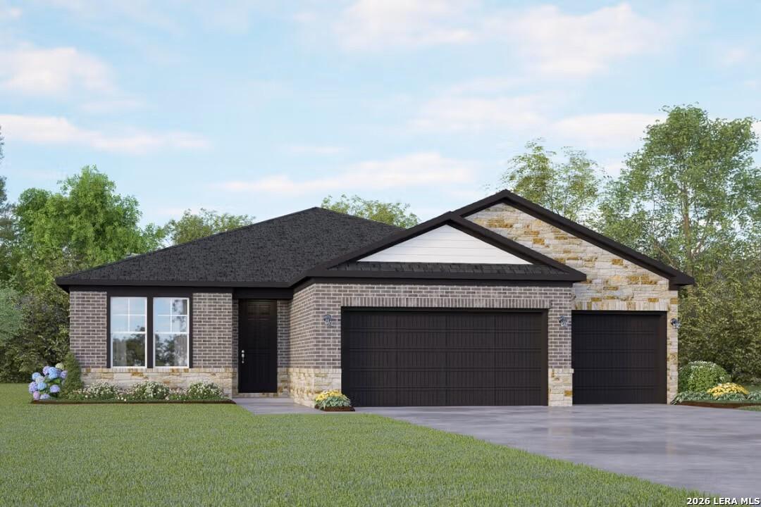 Modern single-story brick home with stone accents, black garage doors, and landscaped yard in The Reserve at Potranco Oaks, Castroville, Texas