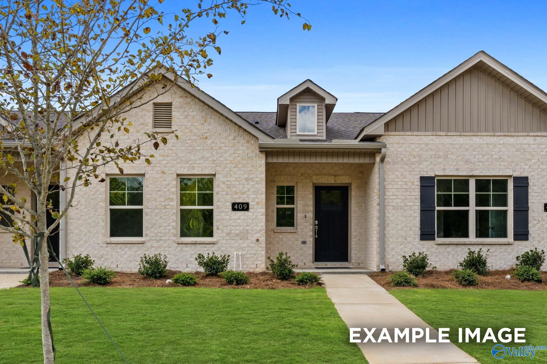 Front exterior of Camilla A floor plan by Davidson Homes in The Retreat at Cain Park, Hartselle, Alabama.