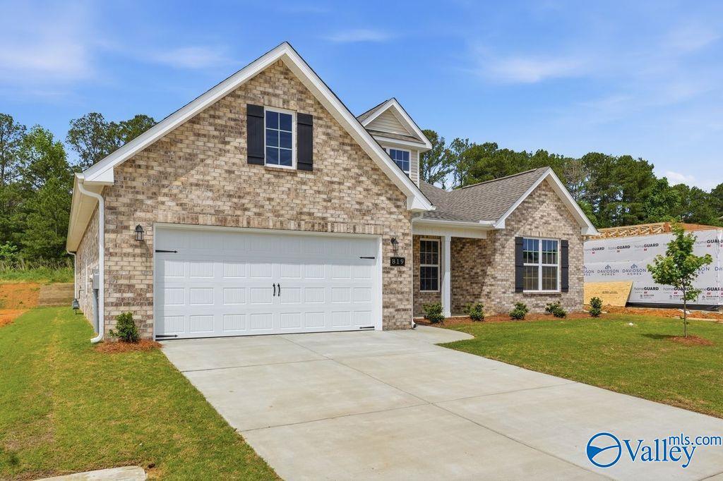 Brick exterior of The Rockford with Bonus floor plan by Davidson Homes in Cain Park, Hartselle, Alabama.