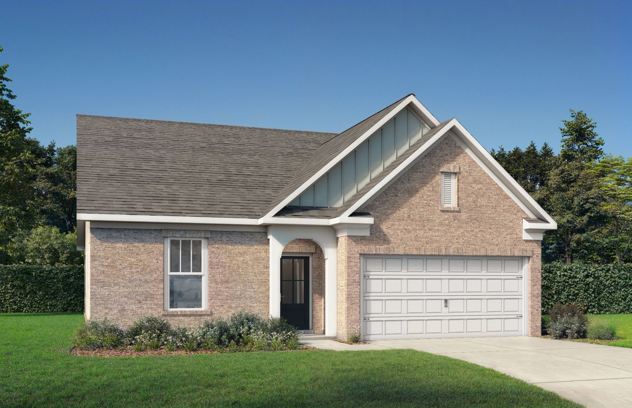 Brick ranch home with gable roof, 2-car garage, arched entry, and landscaped yard in Woods Crossing, Gallatin, TN by Davidson Homes Prairie C
