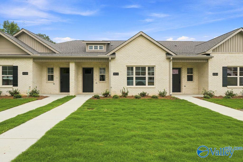 Single-story brick exterior of The Camilla C floor plan by Davidson Homes in The Retreat at Cain Park, Hartselle, Alabama.