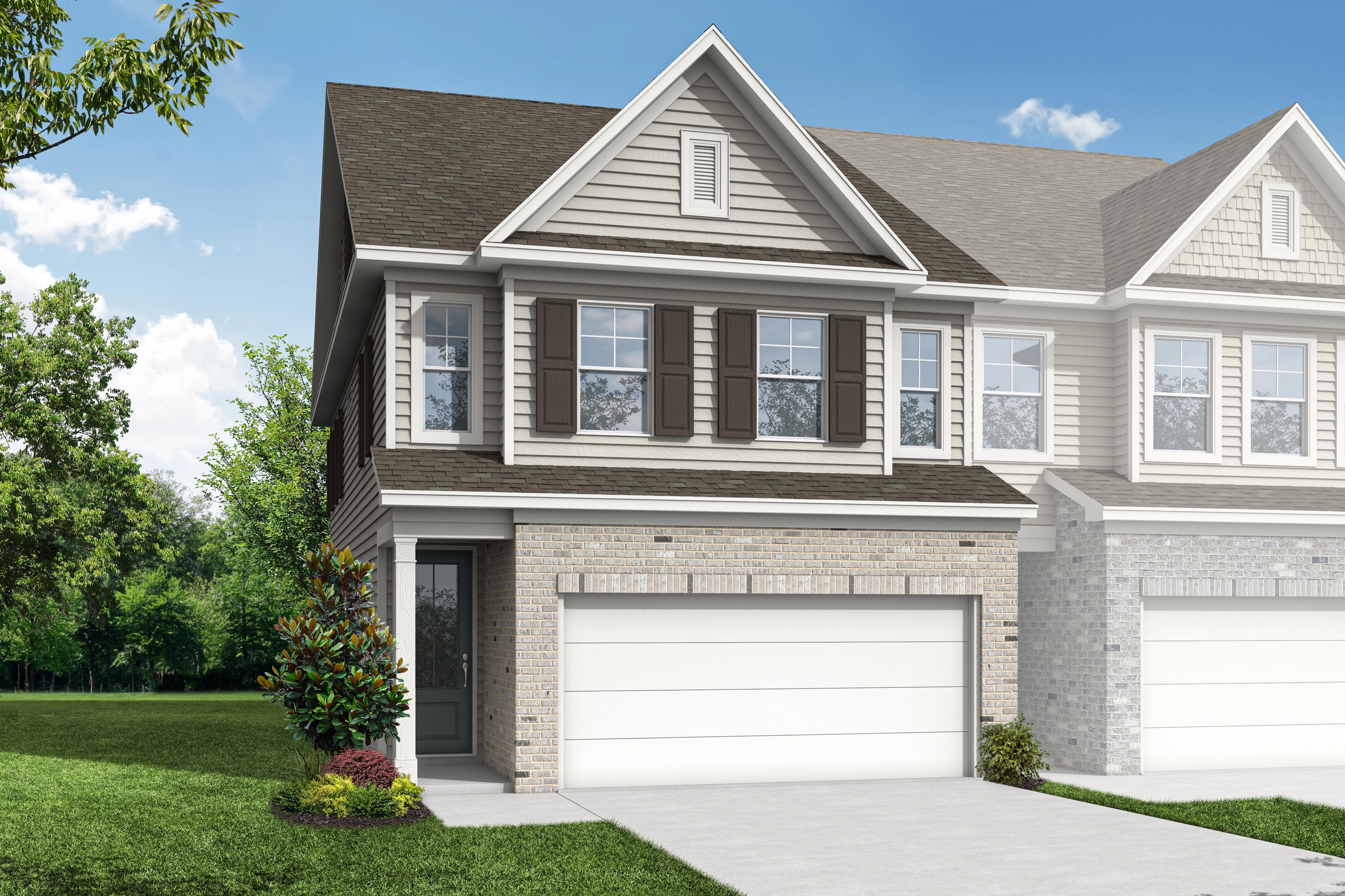 Modern Durham A multi-family home elevation with brick accents, siding, dual garages, and lush landscaping in Cumming, GA