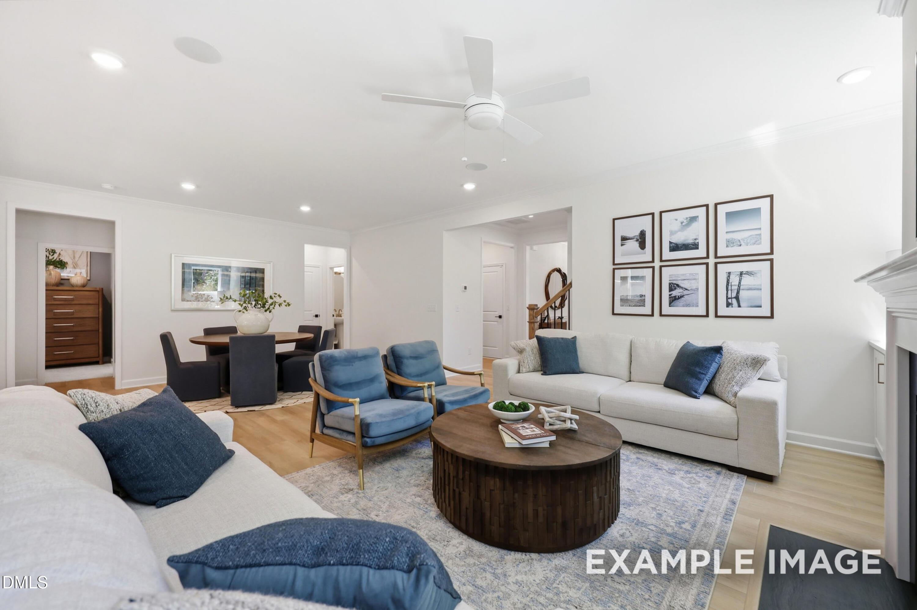 Spacious open-concept living room and dining area in The Aspen B floor plan at Wendell Ridge, Wendell, North Carolina.
