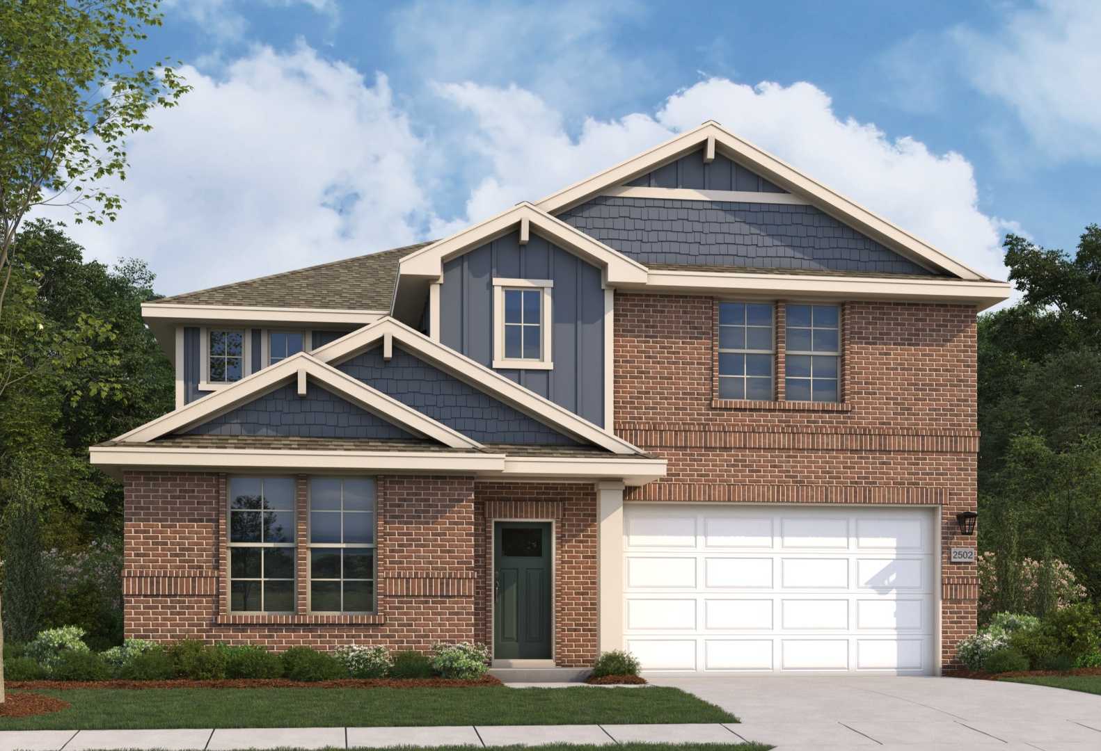 Two-story brick and shake elevation of The Radiance by Evermore Homes, featuring 2-car garage and landscaped yard in Perry, Georgia