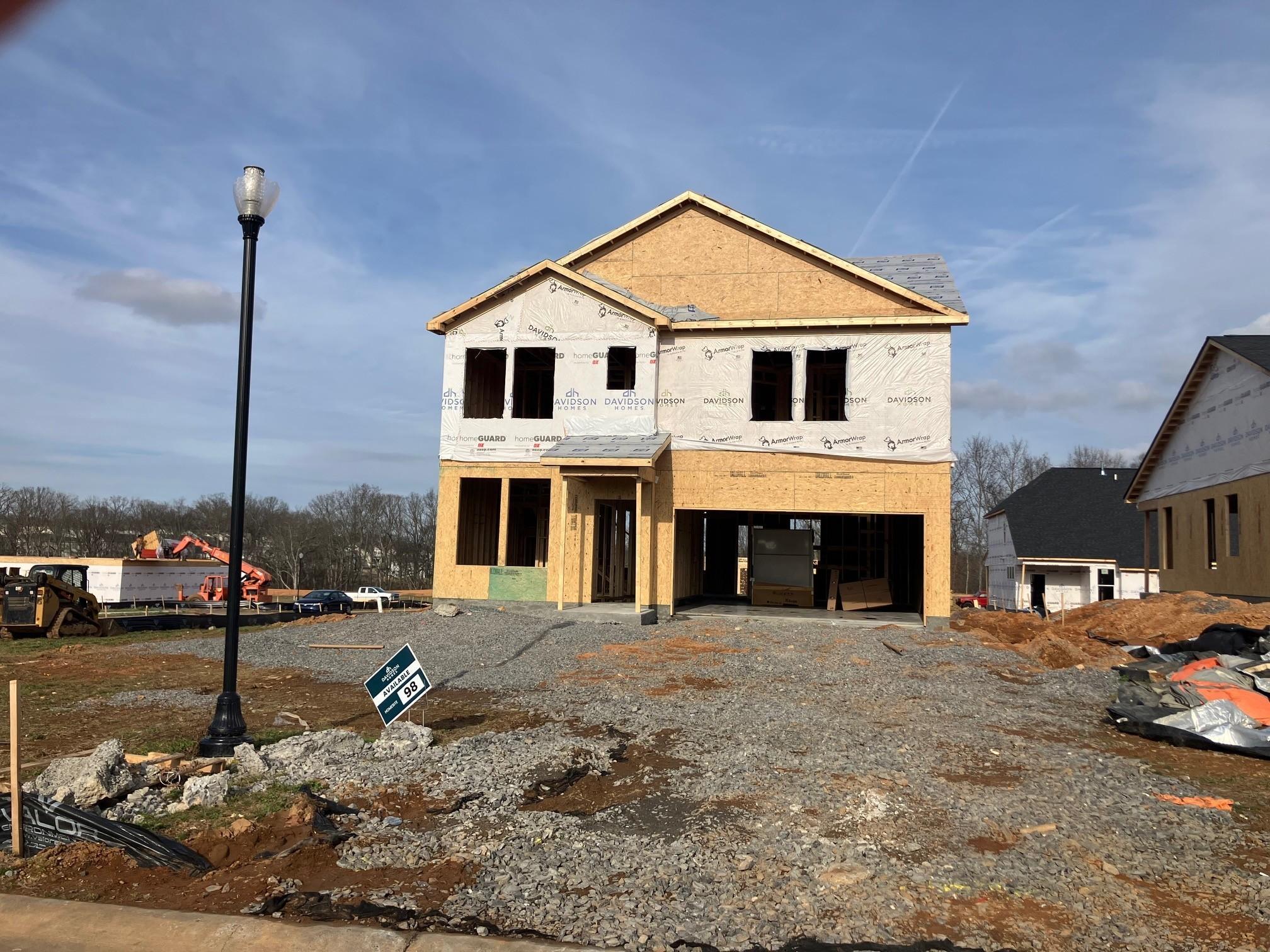 Two-story framed 4-bedroom home under construction with 2-car garage in Calista Farms, White House, Tennessee by Davidson Homes The Logan B