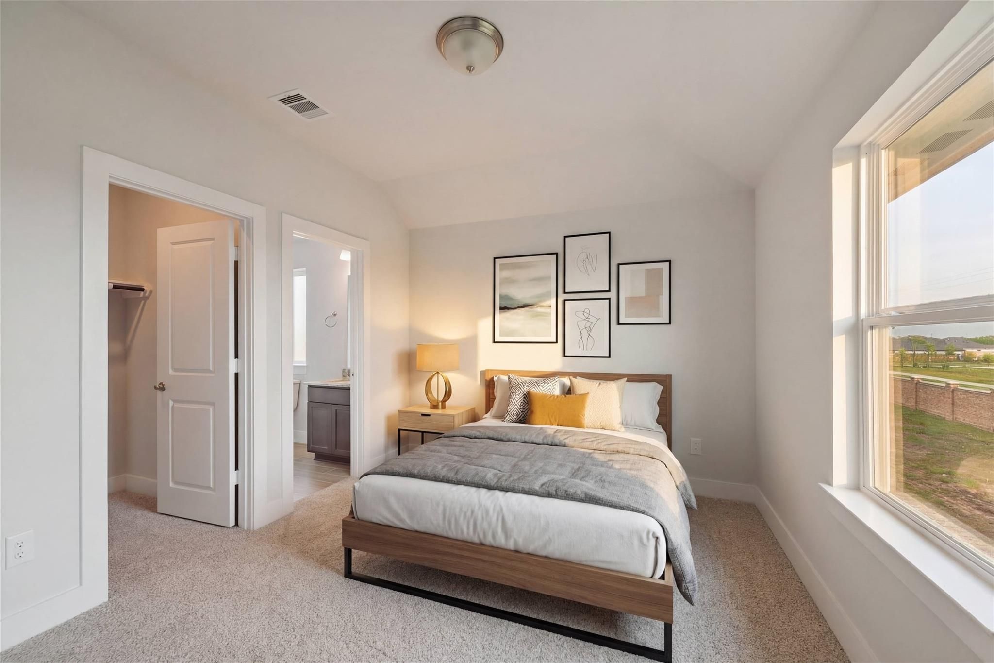 Cozy secondary bedroom with queen bed, neutral tones, wall art, and window view in Davidson Homes The Philip A, Lago Mar, Texas City