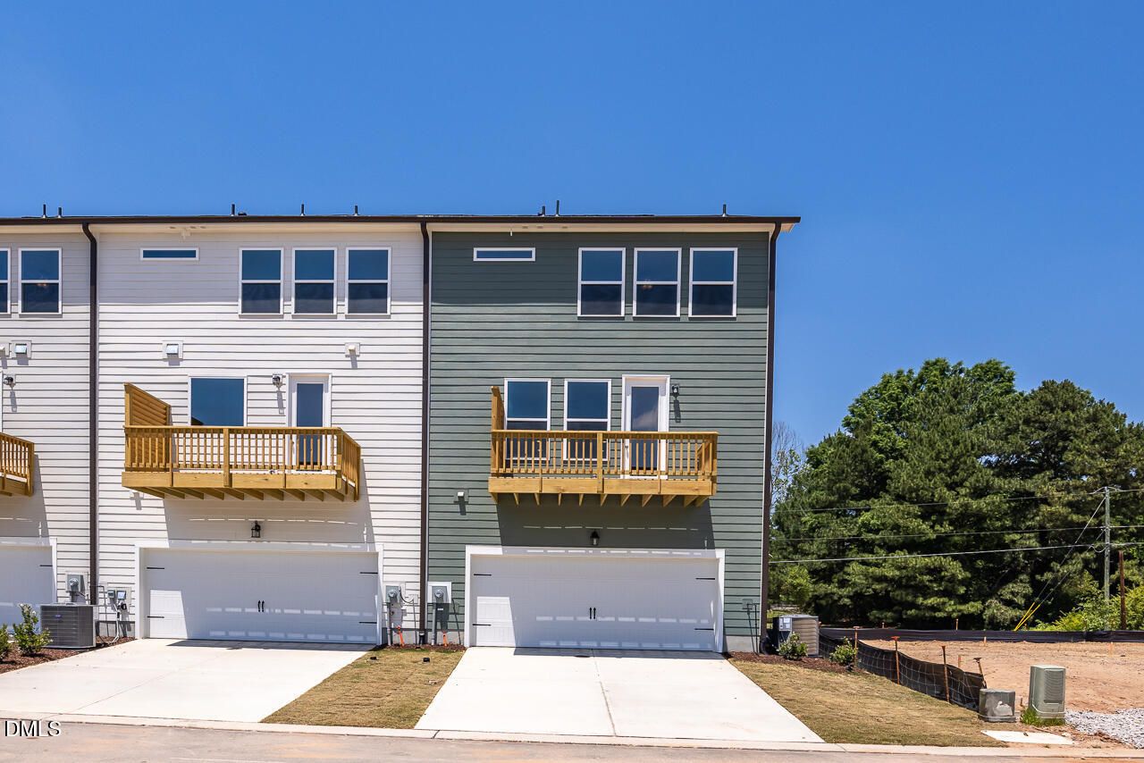 The Mitchell exterior floor plan by Davidson Homes featuring a 3-story design and 2-car garage in Camden Park, Knightdale.