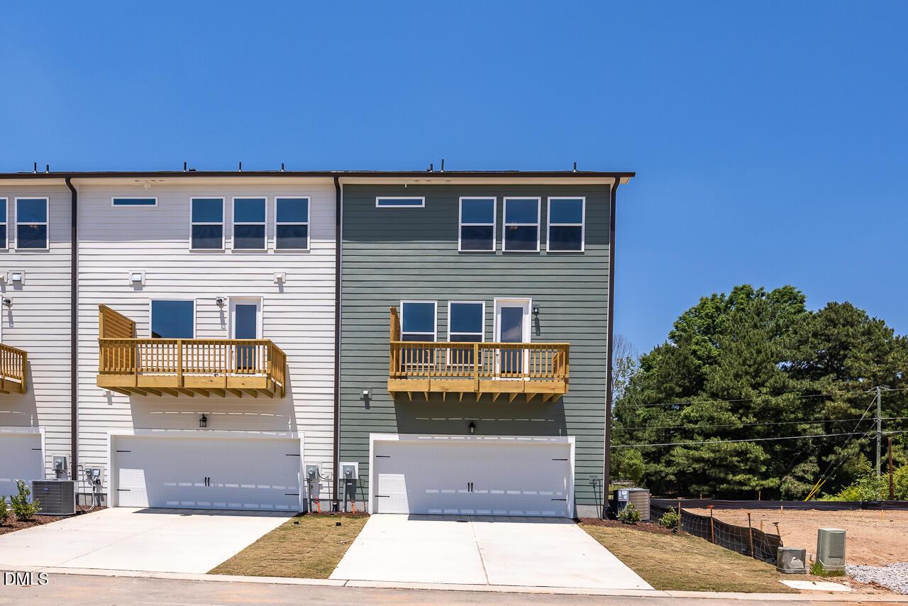The Mitchell exterior floor plan by Davidson Homes featuring a 3-story design and 2-car garage in Camden Park, Knightdale.