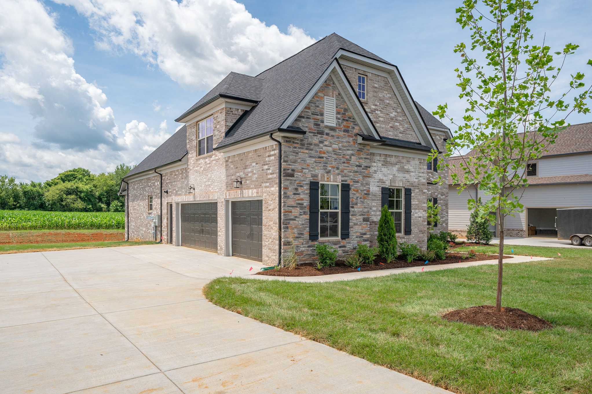 Davidson Homes The Hawkins Floor Plan 3-Car Garage Exterior