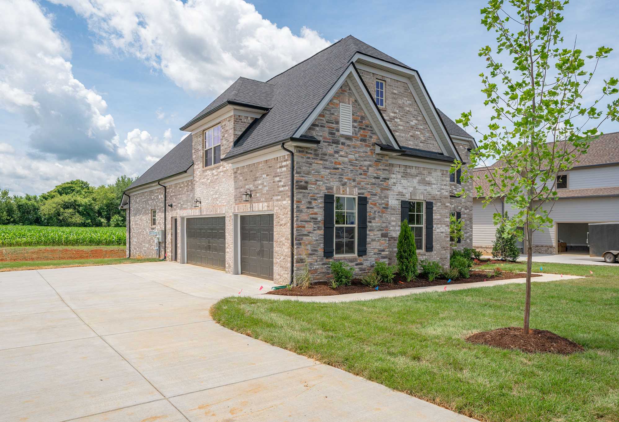 Davidson Homes The Hawkins Floor Plan 3-Car Garage Exterior