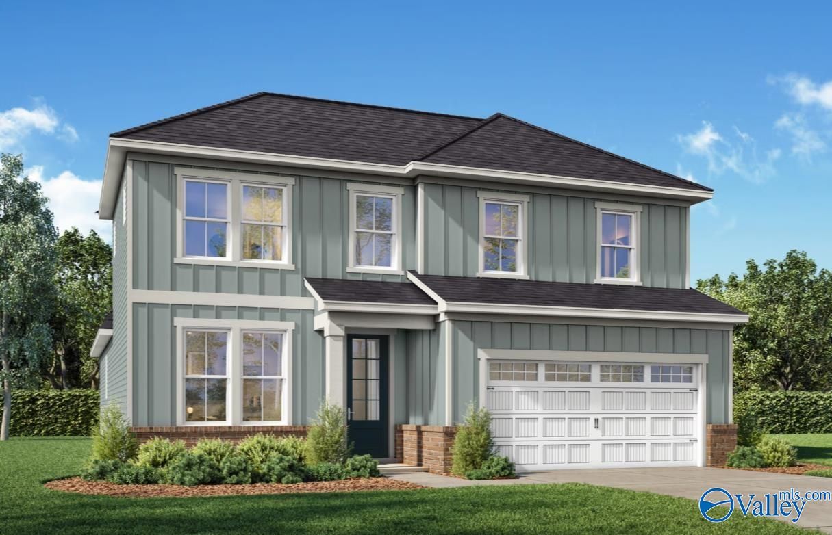Two-story gray siding home with 2-car garage and landscaped yard in Davidson Homes' The Ashport K plan, Forest Glen, Hazel Green, Alabama