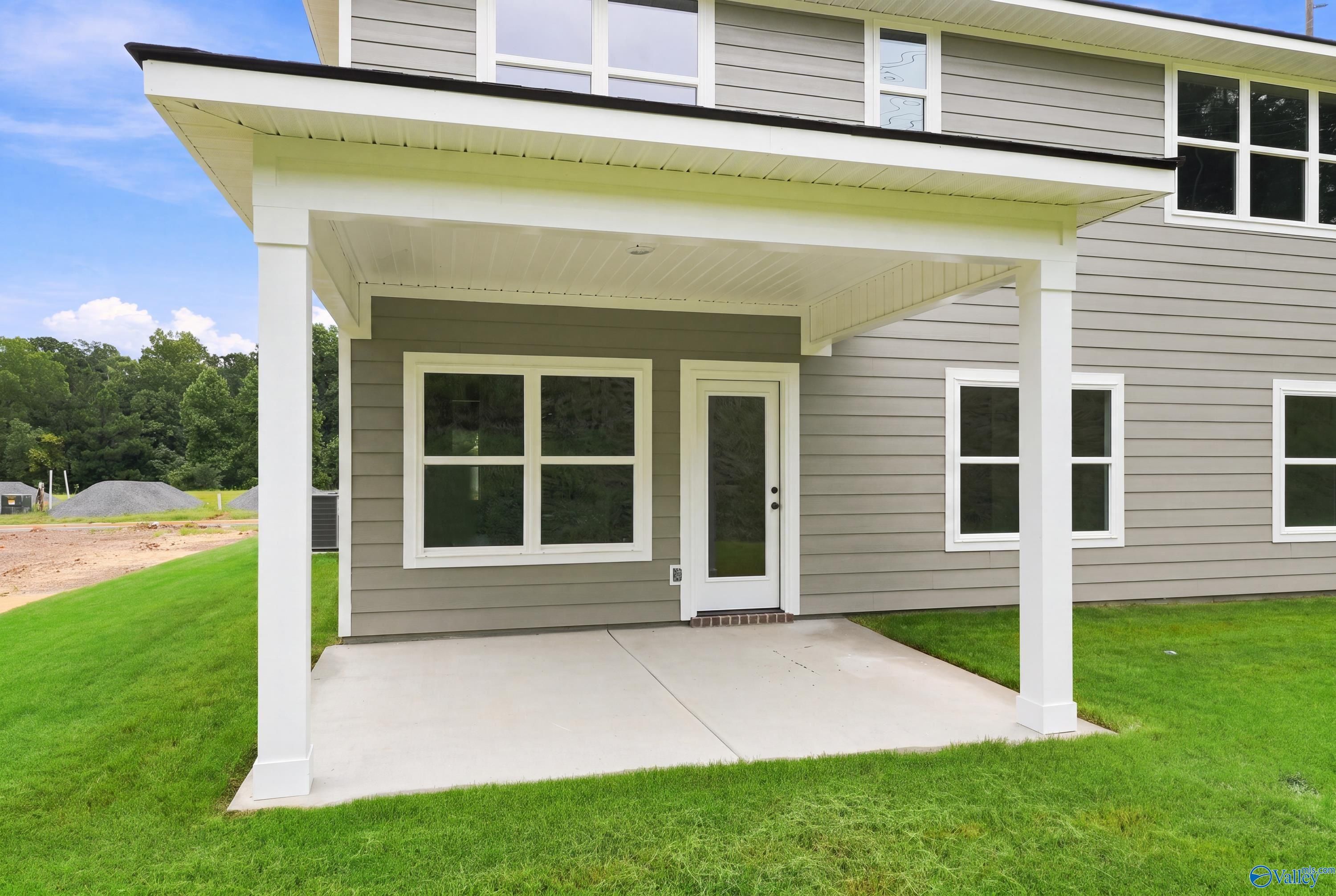 Covered back patio of The Shelby D floor plan by Davidson Homes in Noble Ridge, Cullman, Alabama.