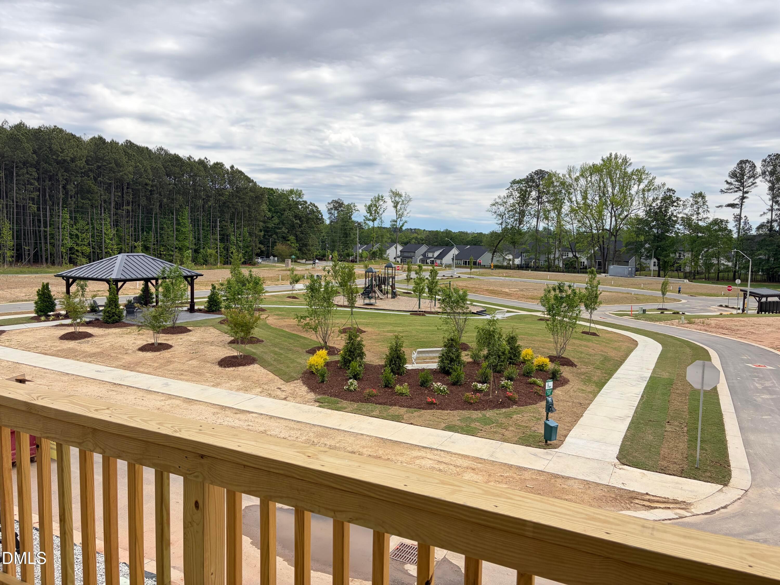 Scenic Camden Park playground with gazebo, benches, walking paths, and surrounding pines in Knightdale, North Carolina