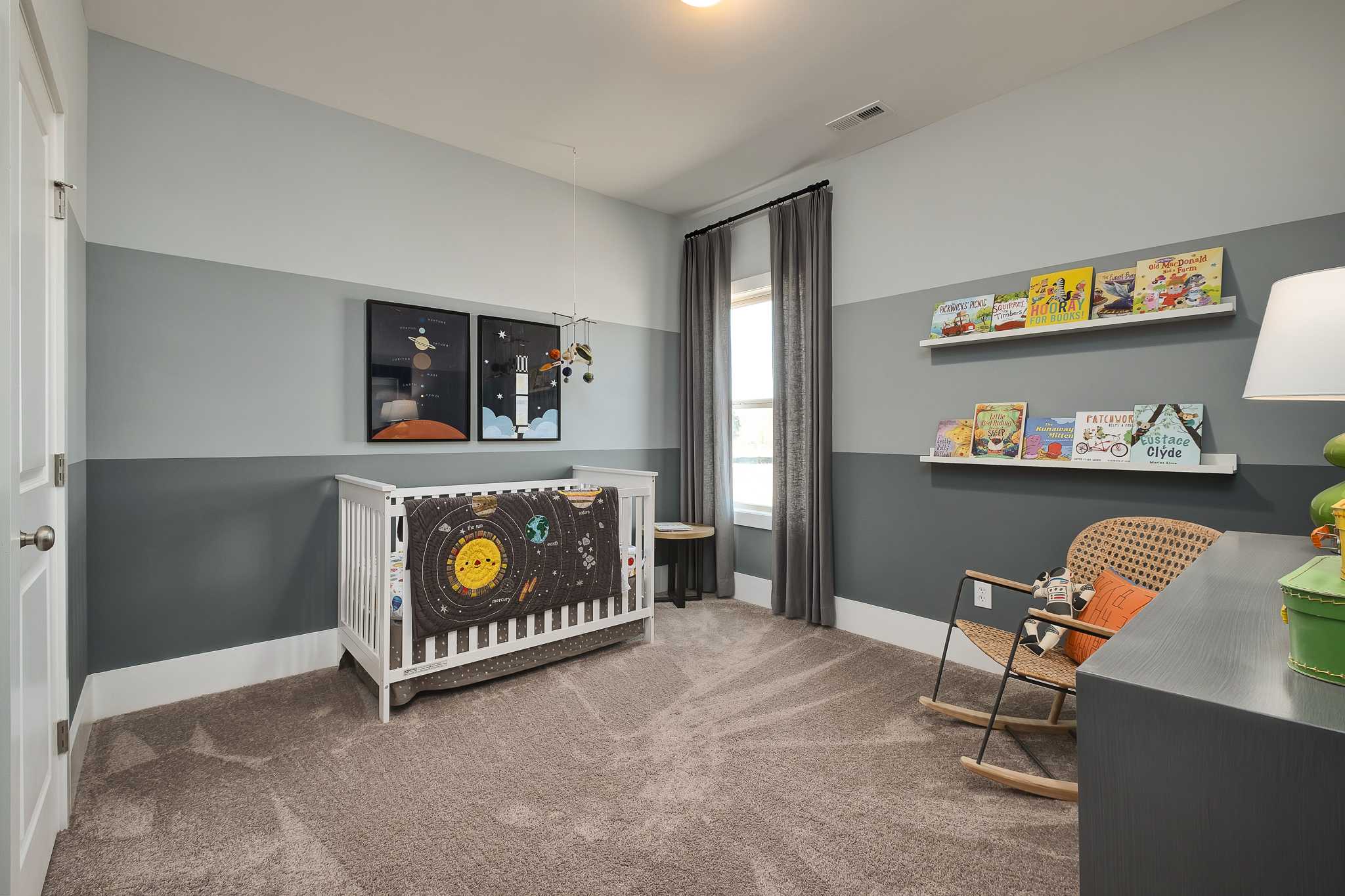bedroom with striped walls and carpet in The Dapne
