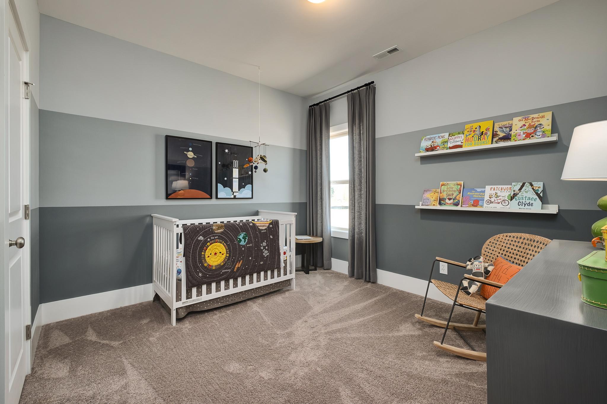 bedroom with striped walls and carpet in The Dapne