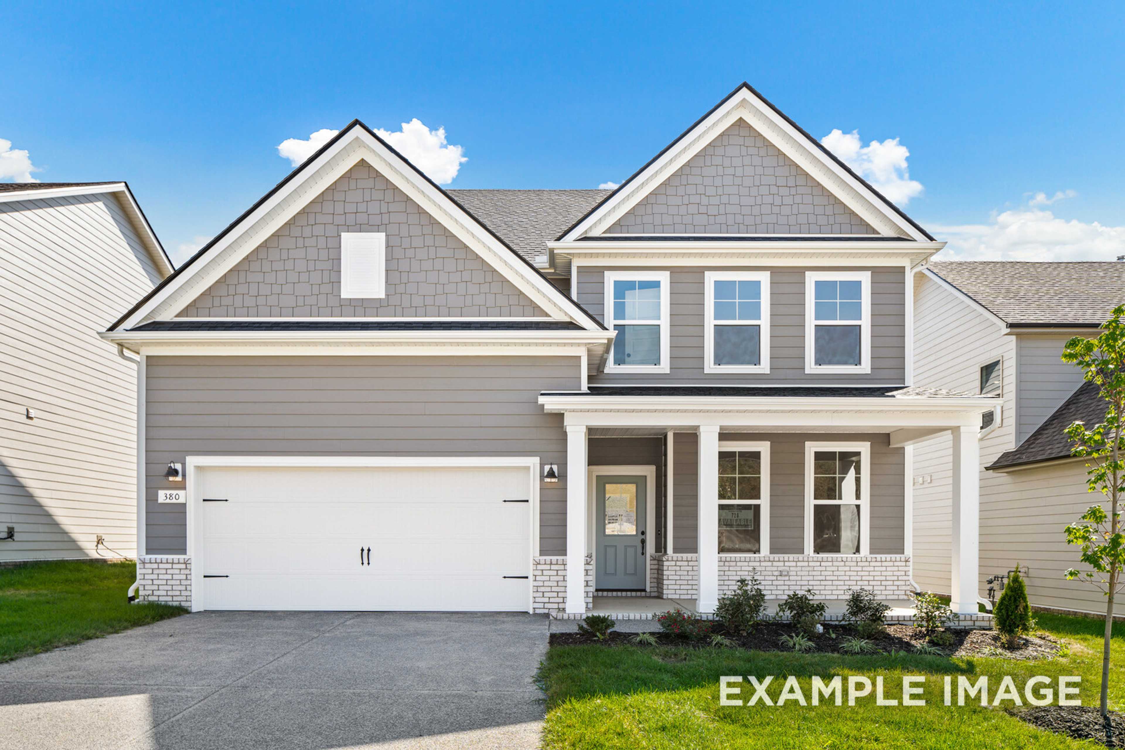 Modern two-story elevation of The Henry C home design with gray siding, gabled roof, front porch, and two-car garage
