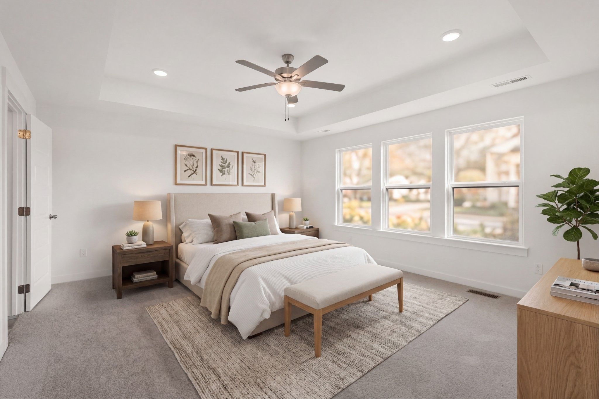 Bright master bedroom with tray ceiling in The Willow D floor plan by Davidson Homes in Benders Cove, Mt. Juliet, Tennessee.