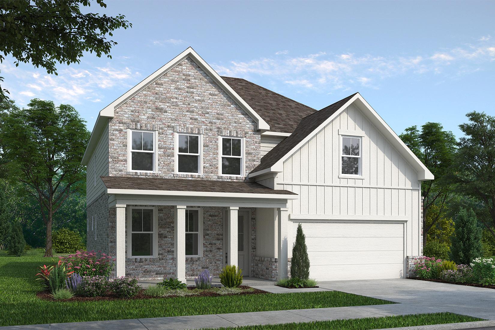 Charming 2-story Hickory H exterior with brick accents, white siding, gabled roof, covered porch, 2-car garage, and lush landscaping in Buford, GA