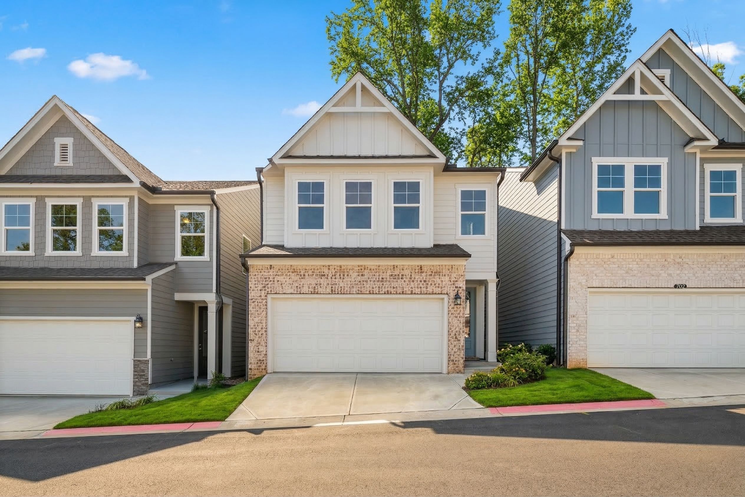 Modern farmhouse home exterior at The Village at Shallowford in Kennesaw, GA, built by Davidson Homes.